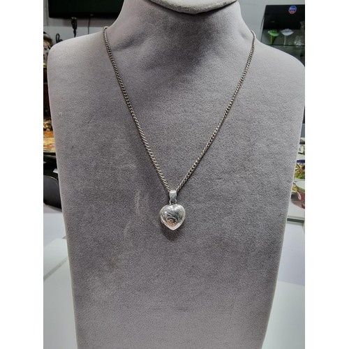 364 - 2 x 925 silver locket pendants including a vintage ornate heart pendant inset with an amethyst gemst... 