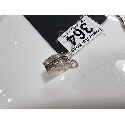 364 - 2 x 925 silver locket pendants including a vintage ornate heart pendant inset with an amethyst gemst... 