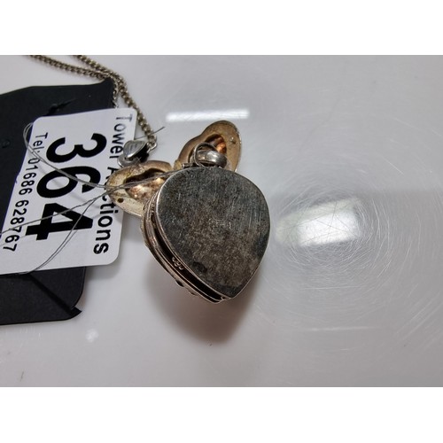364 - 2 x 925 silver locket pendants including a vintage ornate heart pendant inset with an amethyst gemst... 