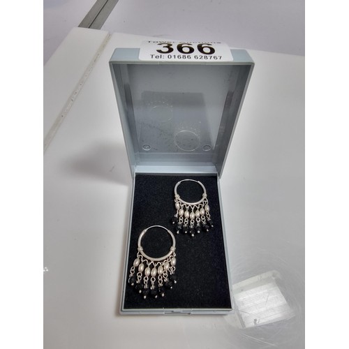366 - A pair of ornate hooped earrings with tassel beaded drops.
In good clean condition, marked 925.
Leng... 