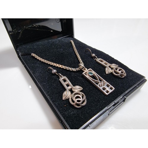 370 - A matching 925 silver jewellery set Rennie Macintosh design. Pendant is inset with a blue stone on a... 