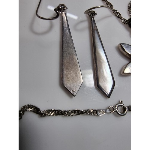 381 - A 925 silver jewellery set including a mother of pearl pendant on an 18