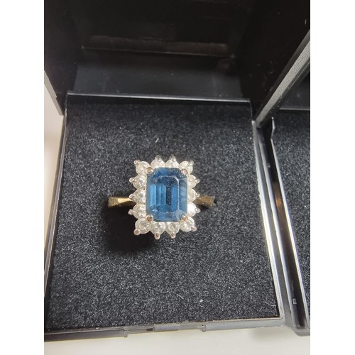 382 - 2 x Ornate costume gold plated dress rings, both are cluster style inset with purple, blue and clear... 