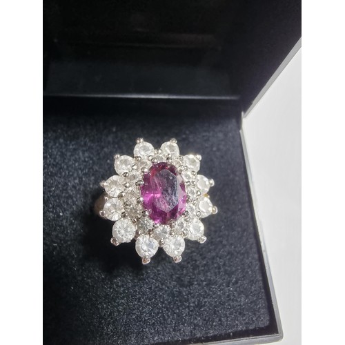 382 - 2 x Ornate costume gold plated dress rings, both are cluster style inset with purple, blue and clear... 