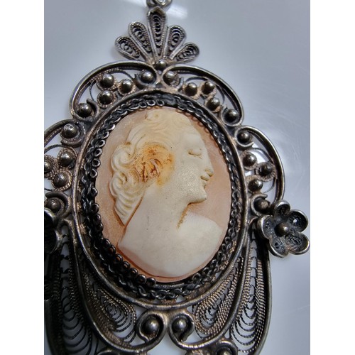 387 - 3 vintage cameo's including a tested as silver pendant, a silver brooch marked 900 silver and one ot... 