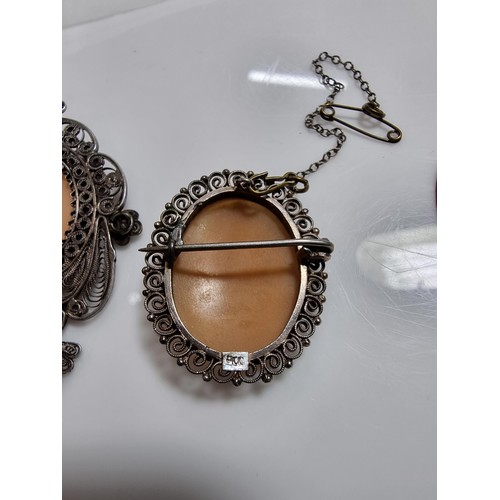387 - 3 vintage cameo's including a tested as silver pendant, a silver brooch marked 900 silver and one ot... 