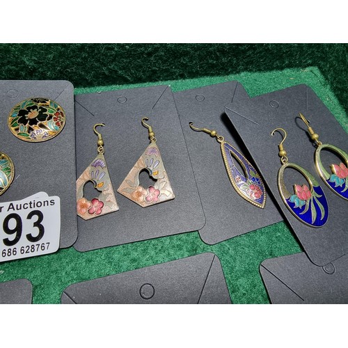 393 - A suite of various costume jewellery including enamelled earrings and ornate fob watch, matching jew... 