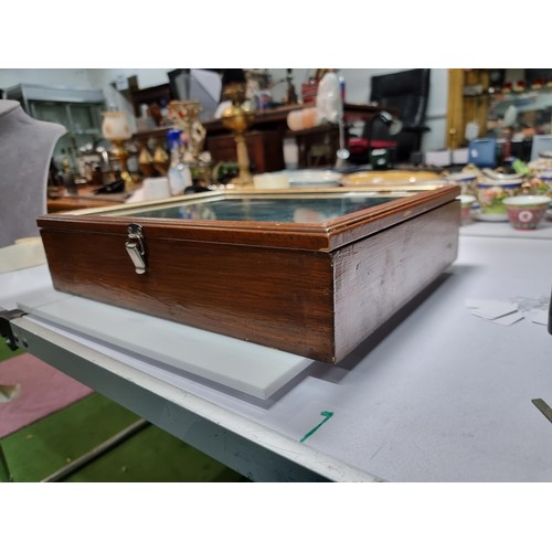 394 - A vintage wooden tabletop display case with a  glazed top in excellent condition, jewellery inside i... 