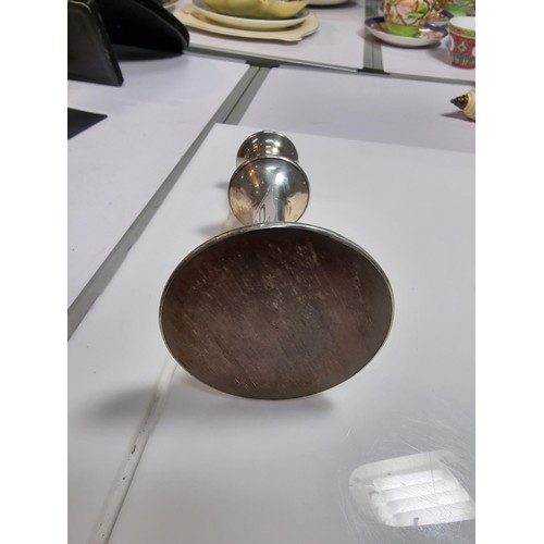 400 - A hallmarked silver candlestick along with a boxed hallmarked silver pair of serviette rings. Candle... 