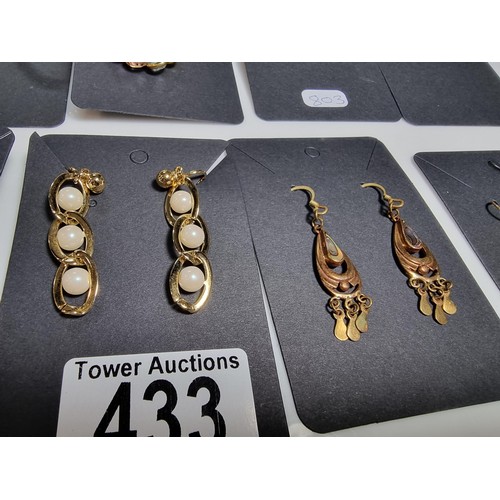 433 - 10 pairs of costume earrings, various designs, all in good condition.