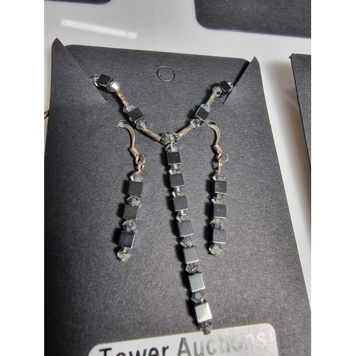 439 - A quantity of 5 matching jewellery sets, 3 of the sets are 925 silver including ones inset with amet... 