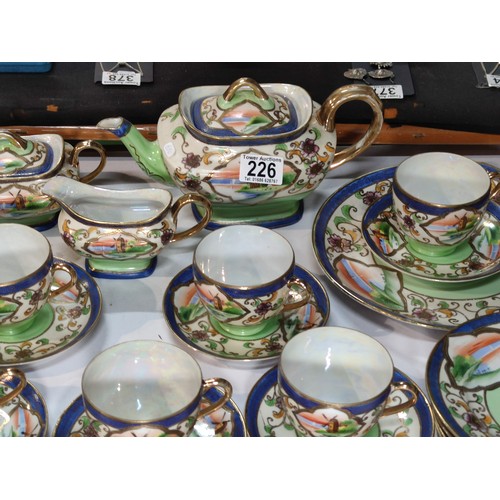 226 - A 22 piece samurai Japan, hand painted, gilt edged tea set. Includes 6 trios, cake plate, teapot, su... 