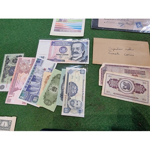 440 - a quantity of ephemera including world bank notes, marriage certificate, small jubilee flags, kensit... 
