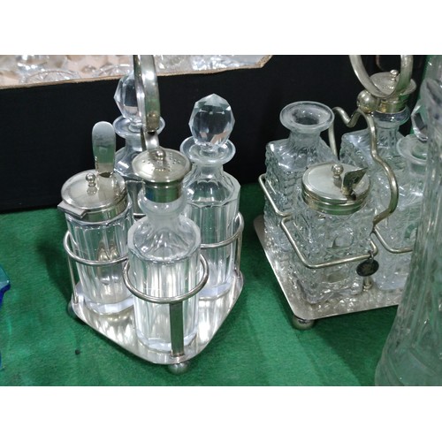299 - 2 boxes containing a large quantity of collectable glassware including 2 cruet sets, sugar bowls, va... 