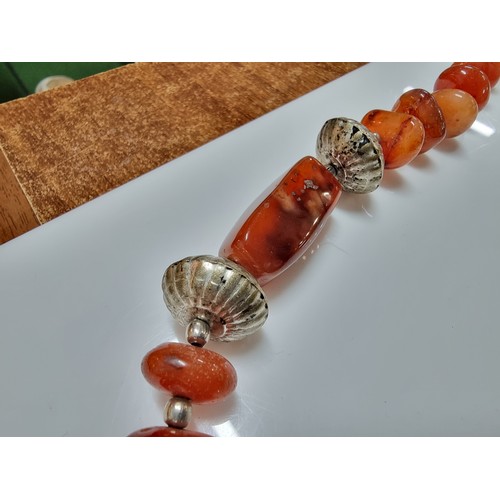 170A - 2x vintage hand made carnelian beaded necklaces one is inset with orange carnelian stones the other ... 