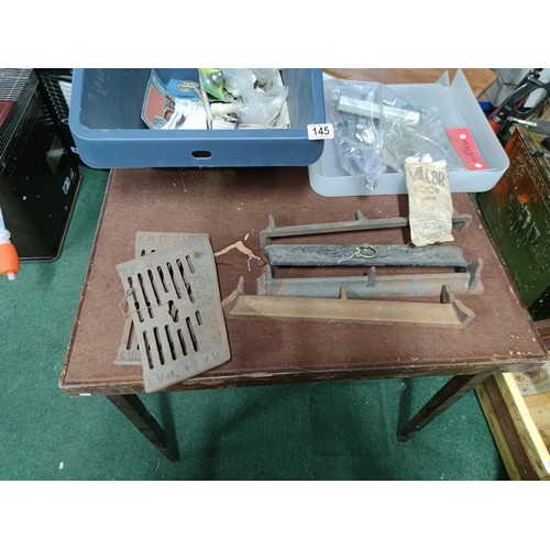 3 - A quantity of fire grate accessories including a cast iron fire pan, cast iron fire fronts along wit... 