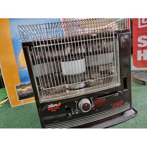 Good quality Zibro kamin turbo electronic paraffin heater model RCA-68E  along with 1x large advertis