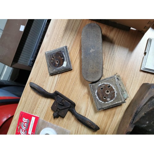 29 - Quantity of vintage bakelite light switches along with a spoke shave, coffin plane etc