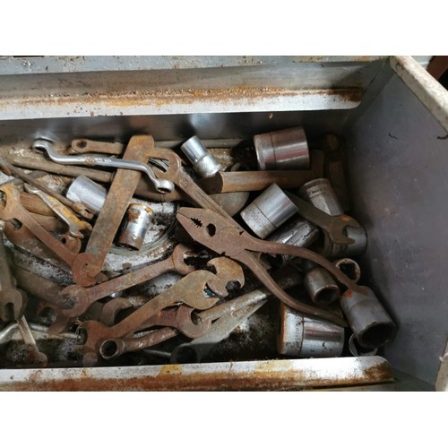 54 - Metal tool box containing a quantity of vintage tools inc spanners, sockets, rulers, security cable ... 