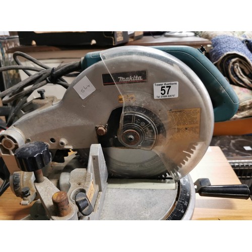 57 - Makita bench saw in good working order complete with DeWalt electric engine all in good order, engin... 