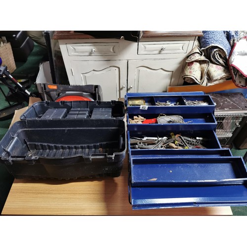 63 - 2x tool boxes inc a metal cantilever tool box containing a quantity of tolls, spanners, masonry chis... 