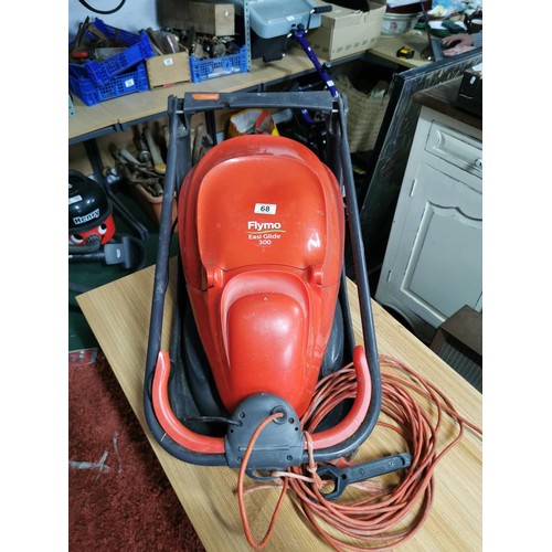 68 - Electric Flymo easyglide 300 hover mower in full working order handle folds down for ease of storage