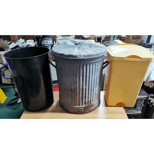 73 - Collection of bins inc a large lidded metal bin in good order along with a black plastic bin and a y... 