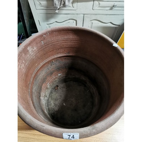 74 - Large terracotta planter with swirl design decoration to the side all in good order height 43cm diam... 