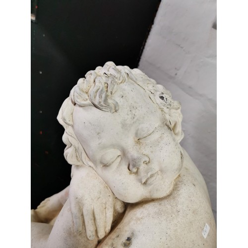 76 - Stunning vintage stoneware cherub seated on a baluster garden figure presenting excellent detail. in... 