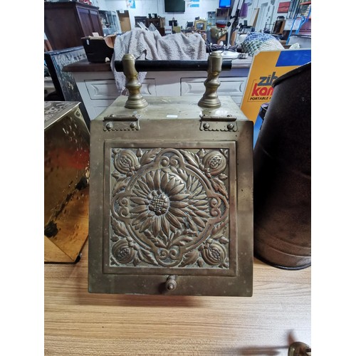 78 - Quantity of fire side brass ware inc a handled coal scuttle, a brass bound log basket along with a m... 