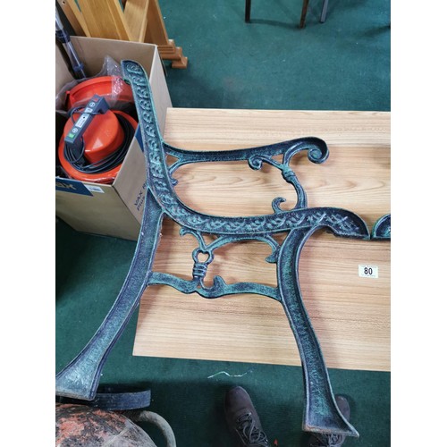 80 - Pair of wrought iron bench ends green in colour in good order height 80cm depth 49cm