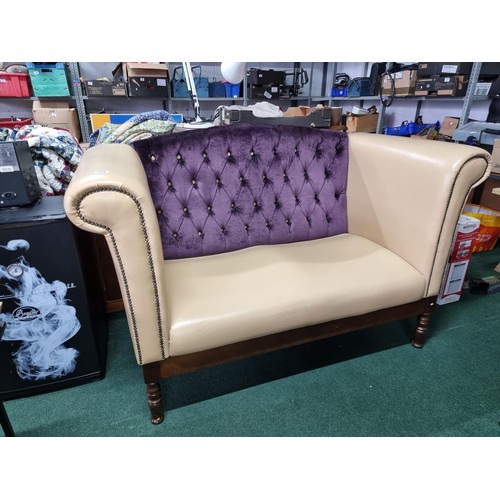 459 - Unusual cream leather deep arm sofa with studded fronts and a purple upholster button back in good c... 