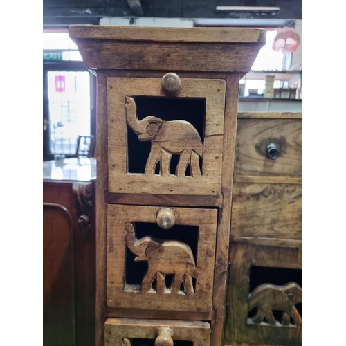 461 - Good quality solid Indian rosewood 5 drawer narrow chest with a carved elephant design to each drawe... 