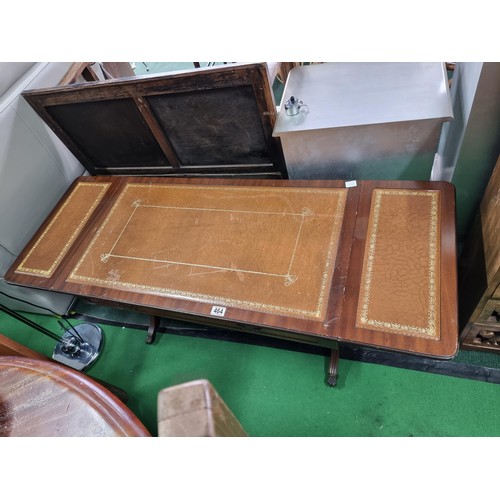 464 - Vintage leather topped mahogany coffee table with drop leaf ends complete with 2 drawers on ornate l... 