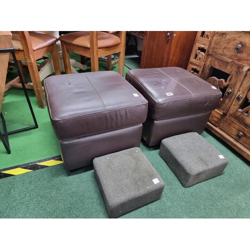 468 - Pair of full brown leather foot stools along with with two small grey upholstered foot stools, both ... 