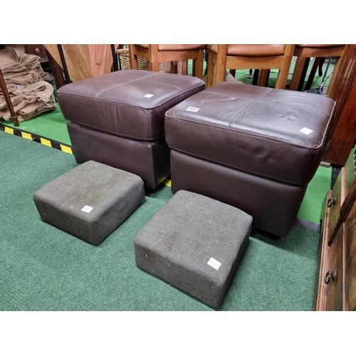 468 - Pair of full brown leather foot stools along with with two small grey upholstered foot stools, both ... 