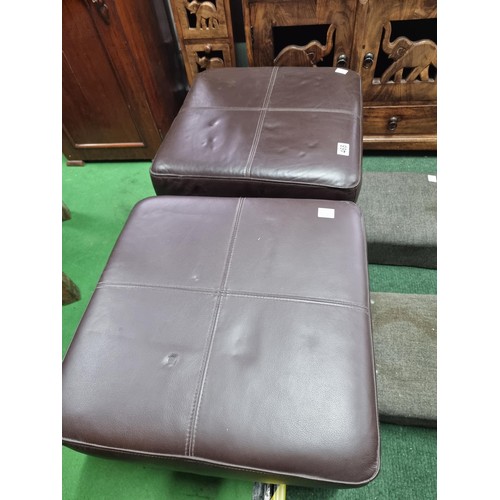 468 - Pair of full brown leather foot stools along with with two small grey upholstered foot stools, both ... 