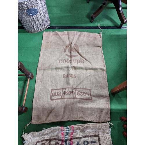 475 - Large quantity of vintage hessian sacks some include good advertising for Brazilian and Columbia cof... 