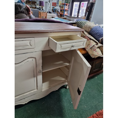 477 - Vintage Laura Ashley Bramley range cream painted dresser two drawers above to cupboards with a solid... 