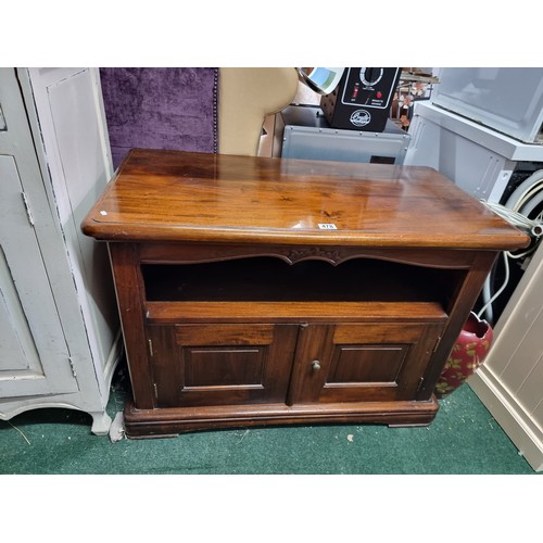 478 - Fine quality solid Brazilian rosewood TV cabinet of solid construction with two panelled drawers to ... 