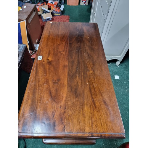 478 - Fine quality solid Brazilian rosewood TV cabinet of solid construction with two panelled drawers to ... 