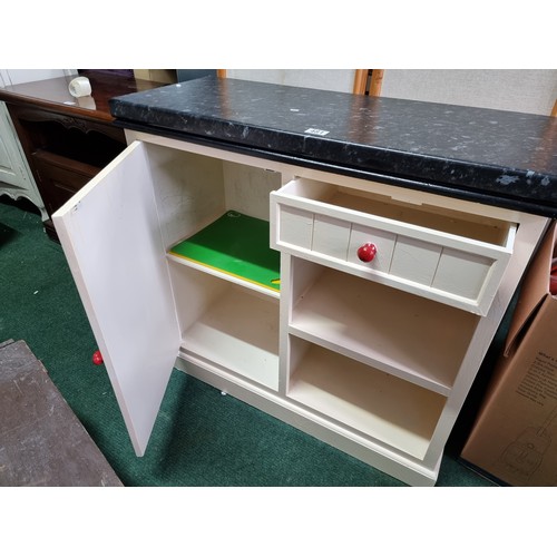 481 - Good quality vintage cream painted kitchen unit with a solid thick work top featuring red painted ha... 