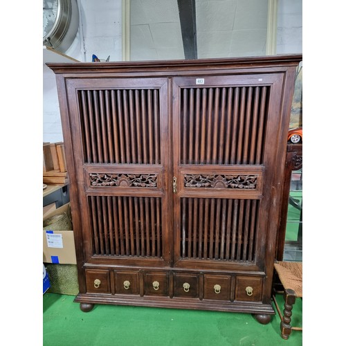 483 - Fine quality vintage Burmese solid teak wooded linen cupboard with two large doors with a rail / gri... 