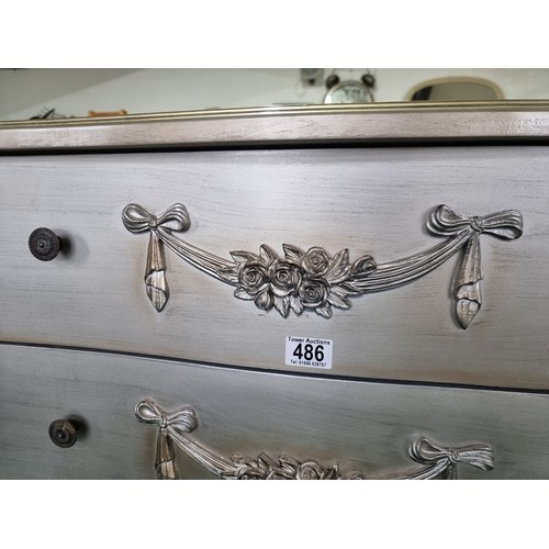 486 - Attractive 3 piece matching bedroom set in silver with an ornate design inc a four drawer chest alon... 