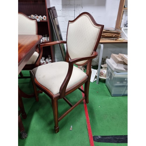 492 - Beresford & Hicks extending mahogany dining table with a set of four plus 2 carver chairs matching w... 