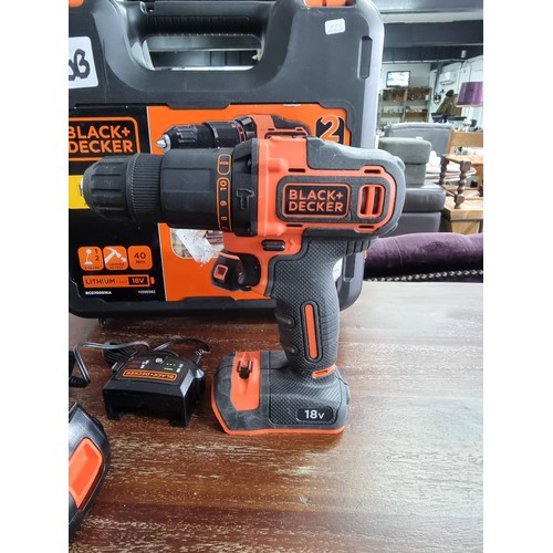 20B - Black and Decker Drill as new with 18v battery in hard case. Drill has a Hammer Drill option.