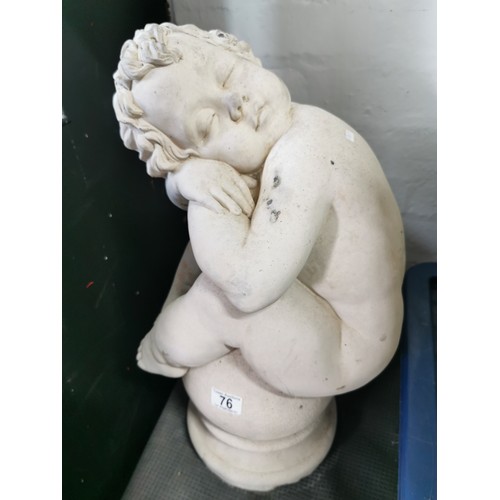 76 - Stunning vintage stoneware cherub seated on a baluster garden figure presenting excellent detail. in... 