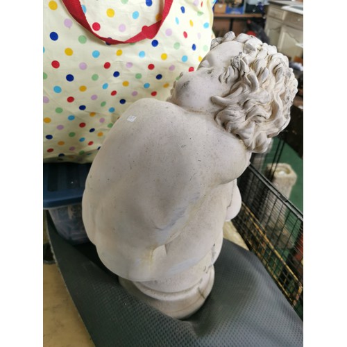 76 - Stunning vintage stoneware cherub seated on a baluster garden figure presenting excellent detail. in... 