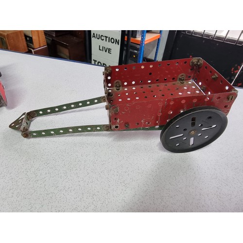 156 - An interesting early vintage Meccano tractor and trailer fully assembled, all with vintage parts and... 