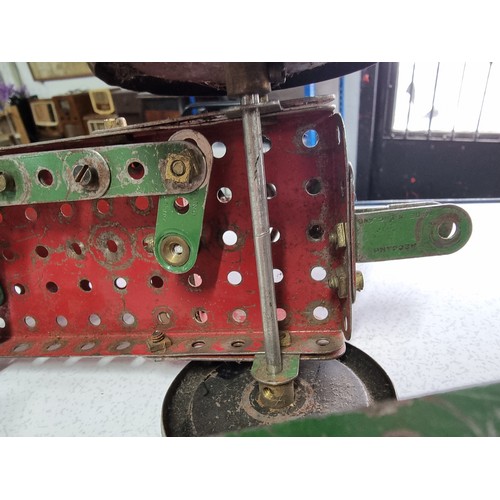 156 - An interesting early vintage Meccano tractor and trailer fully assembled, all with vintage parts and... 